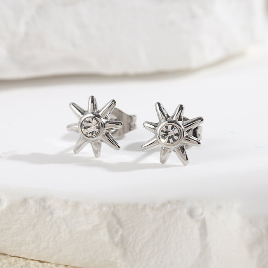 Boucles d'Oreilles Argentées Puces Soleils Avec Strass