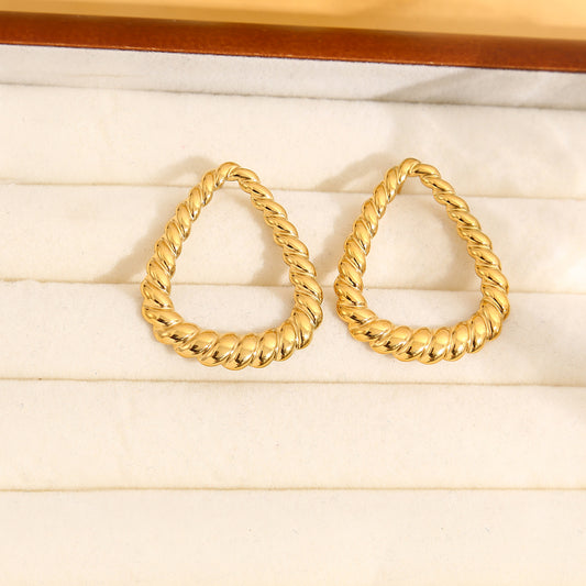 Boucles d'oreilles dorées triangle arrondis