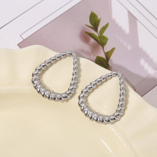 Boucles d'oreilles argentées triangle arrondis