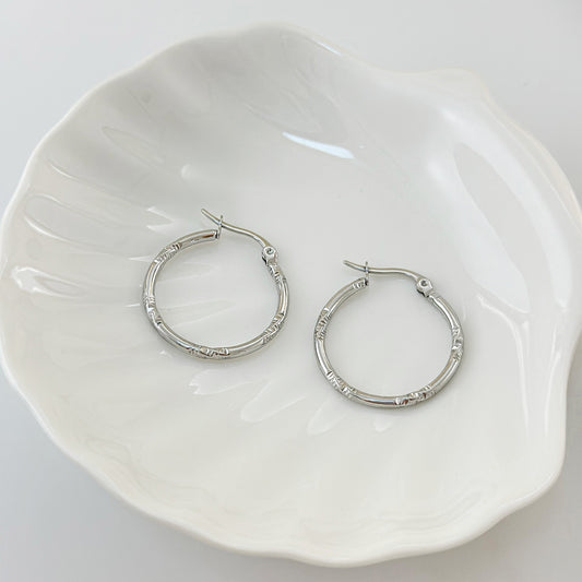 Boucles d'Oreilles Argentées Créoles Lisses Et Brillantes