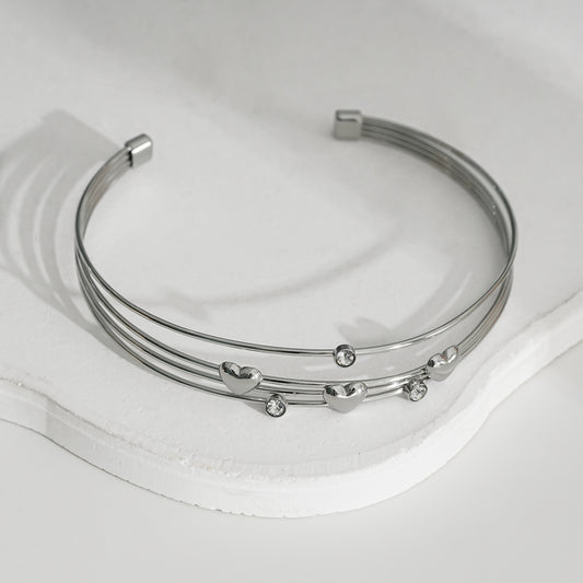 Bracelet Argenté Jonc Ouvert Quadruple Fils Ornés de Cœurs Et Strass