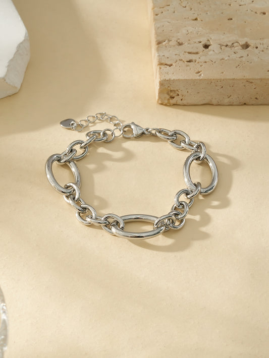 Bracelet Argenté Avec Trois Large Maillons Séparés