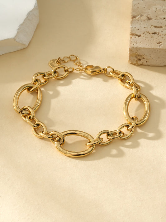 Bracelet Doré Avec Trois Large Maillons Séparés