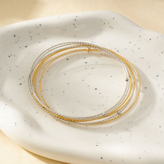 Bracelet Joncs Multiples Cercles Fins Dorés Et Argentés Ornées Boules