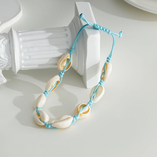 Chaîne de cheville fil bleu avec coquillages