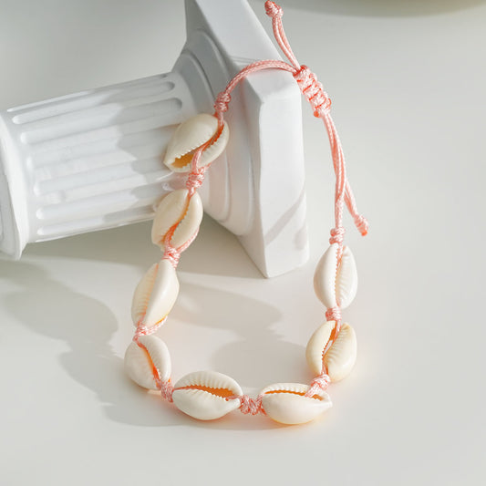 Chaîne de cheville fil rose avec coquillages