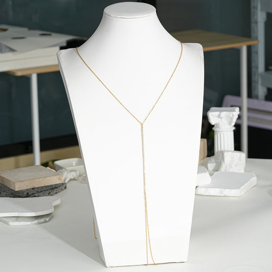 Chaîne de corps dorée avec strass au milieu