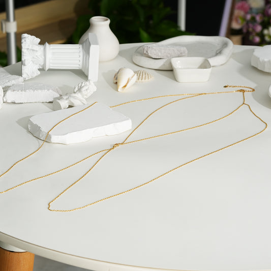 Chaîne de corps dorée avec oxyde de zirconium