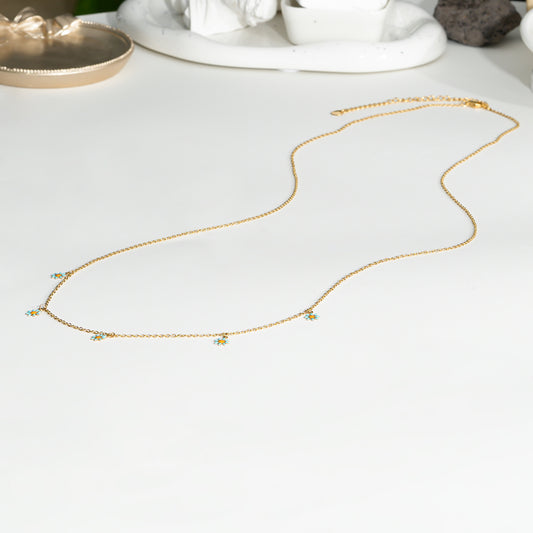 Chaînes de taille doré avec marguerites