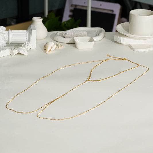 Chaîne de corps dorée avec pendentif strass