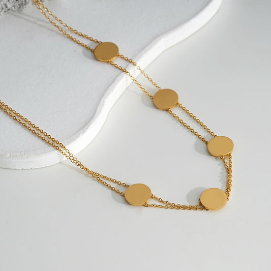 Collier ras du cou doré double ligne avec disques