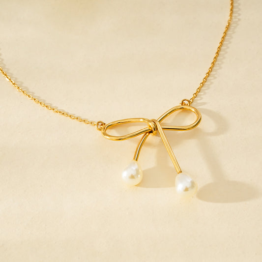 Collier Doré Grand Nœud Papillon Avec Perles Sur Pointes