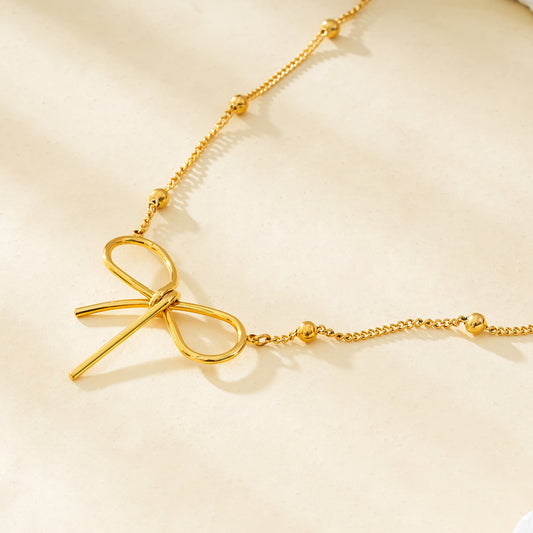 Collier Doré Chaîne Ornée de Boules Dorées Avec Grand Papillon