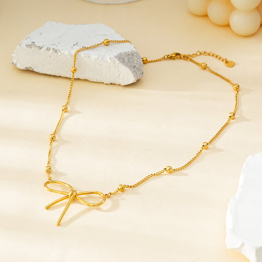 Collier Doré Chaîne Ornée de Boules Dorées Avec Grand Papillon