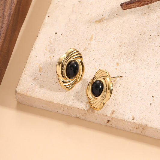 Boucles d'Oreilles Dorées Vintage Avec Pierre Noire Ovale Et Motif Ondulé Sculpté