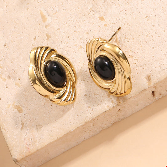 Boucles d'Oreilles Dorées Vintage Avec Pierre Noire Ovale Et Motif Ondulé Sculpté