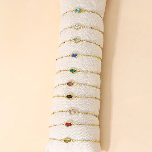 Lot de 12 Bracelets Dorés Avec Pierre Ovale Colorée sur Coussin
