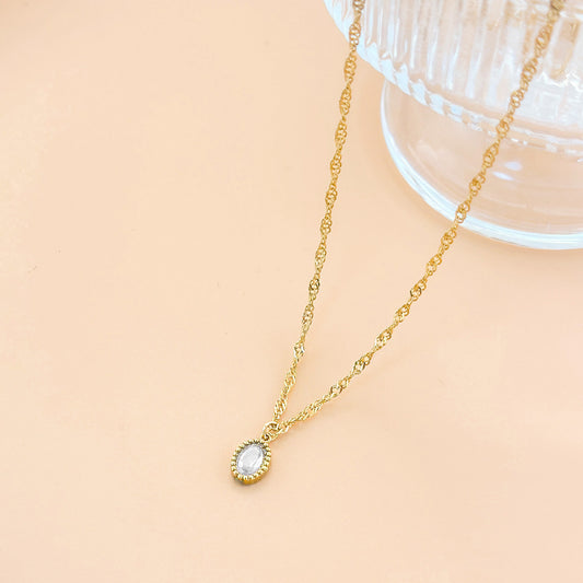 Collier Chaîne Fine Torsadée Dorée Avec Pierre Ovale Cristal