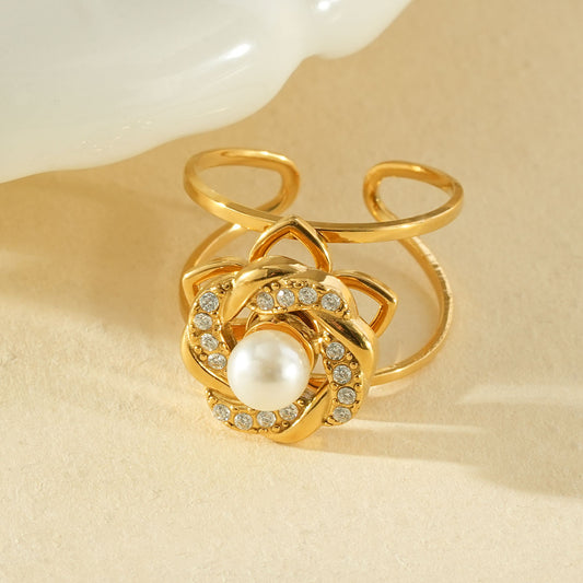Bague dorée ajustable anti stress perle centrale fleur tournante