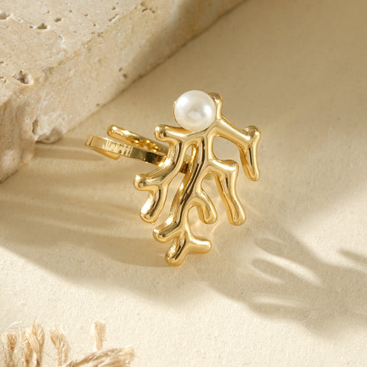 Bague dorée ajustable corail avec une perle