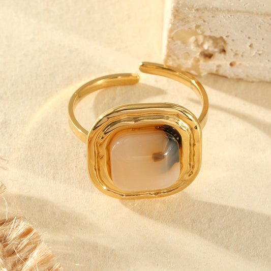 Bague dorée ajustable pierre carrée résine léopard