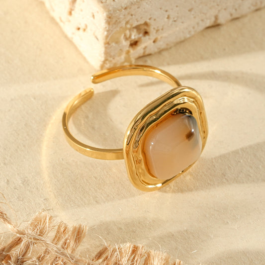 Bague dorée ajustable pierre carrée résine léopard