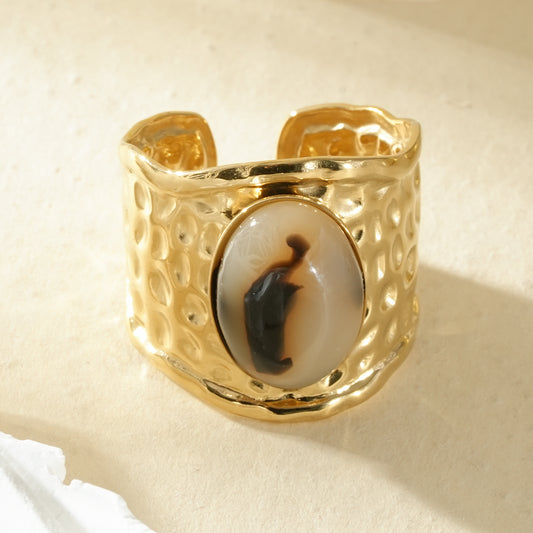 Bague dorée large ajustable martelée pierre ovale résine léopard