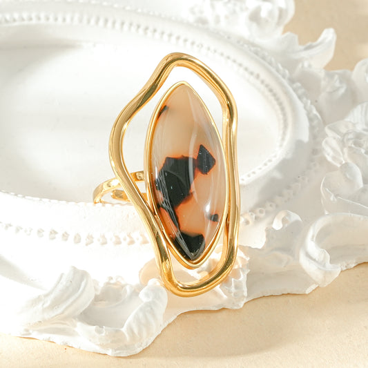 Bague dorée ajustable pierre navette résine léopard