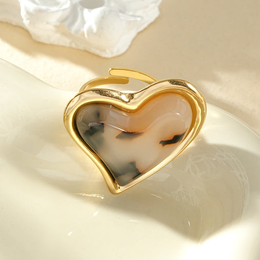 Bague dorée ajustable pierre forme de cœur résine léopard