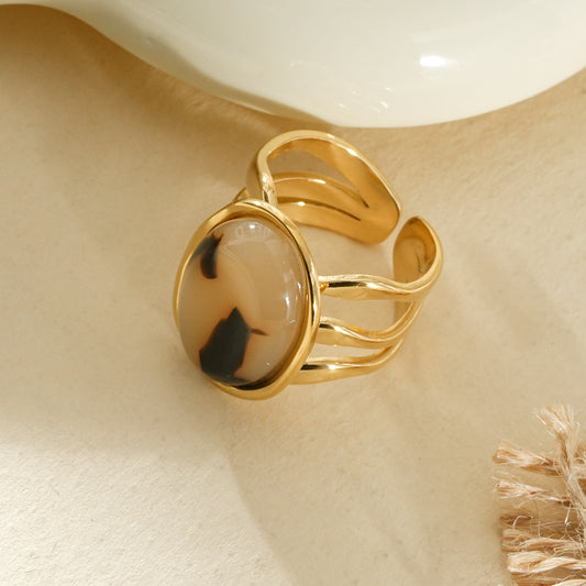Bague dorée triple branches pierre ovale résine léopard