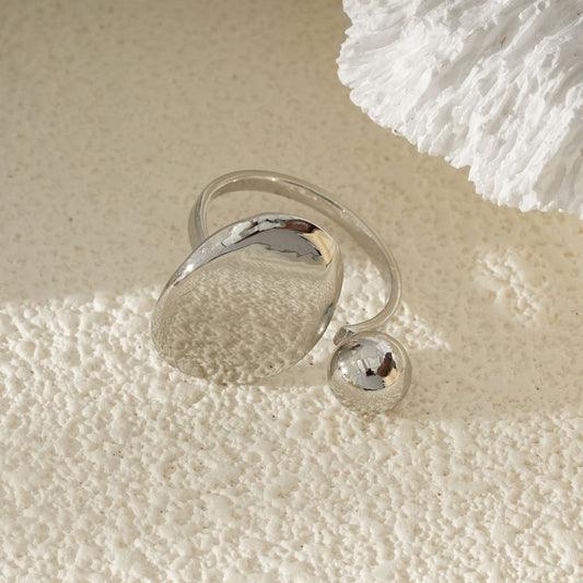 Bague Argentée Ouverte Avec Sphère Et Disque