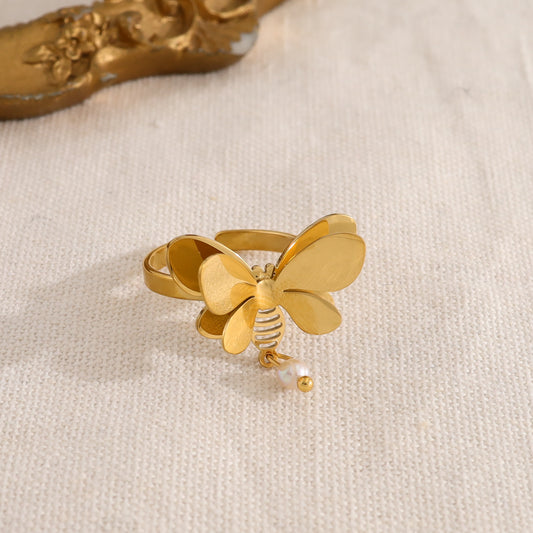 Bague dorée papillon avec pendentif