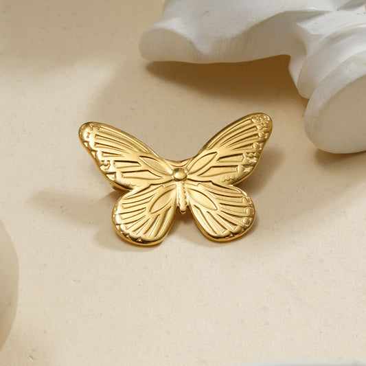 Broche aimantée dorée papillon