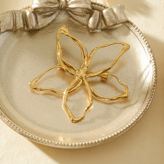 Broche dorée fine fleur