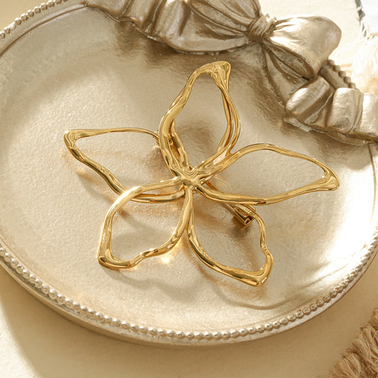 Broche dorée fine fleur