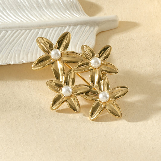 Broche fleurs dorées perles centrales