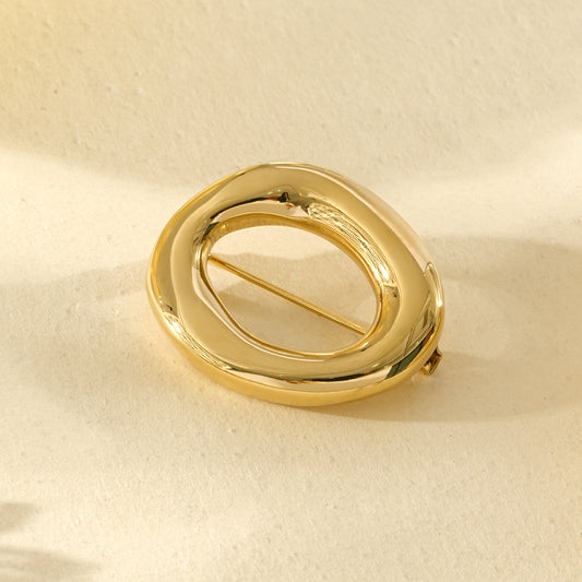 Broche ovale chic et intemporel ajourée finition brillante