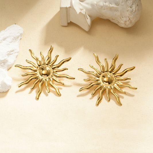 Boucles d'oreilles dorées soleil avec rayons