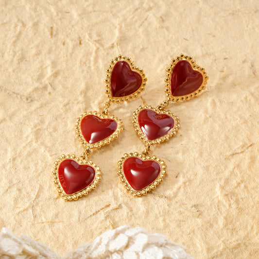 Boucles d'oreilles triples cœurs pendants rouge