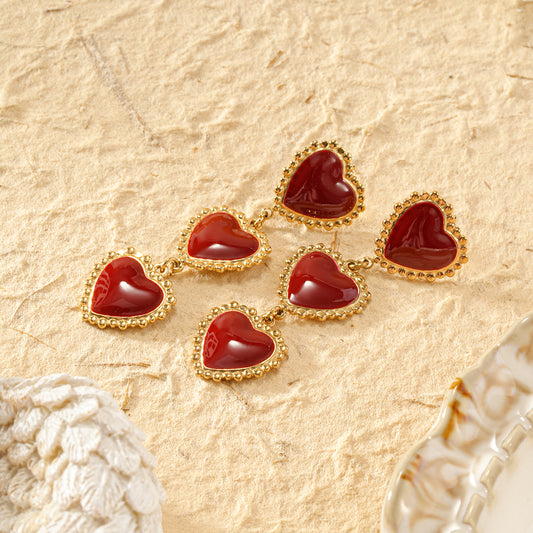 Boucles d'oreilles triples cœurs pendants rouge