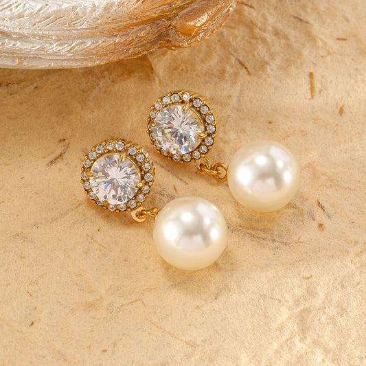 Boucles d'oreilles dorées strassées pendentif perle blanche