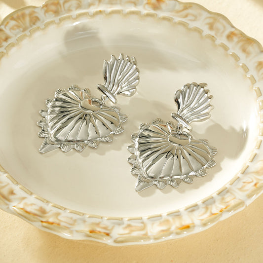 Boucles d'oreilles argentées pendantes grand cœur bombé texturé