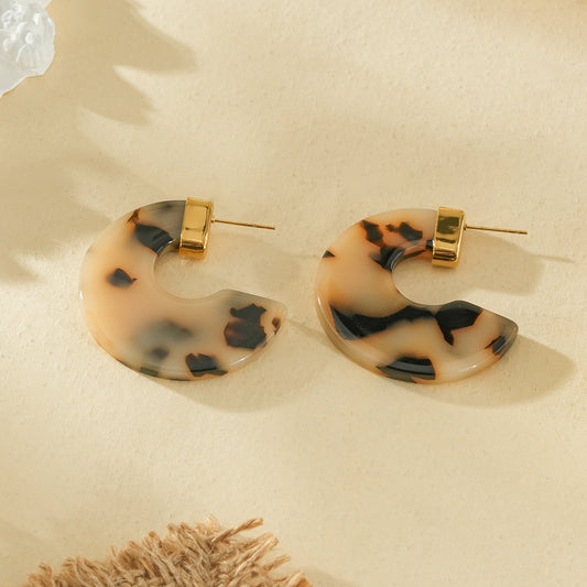 Boucles d'oreilles créoles rondes résine léopard