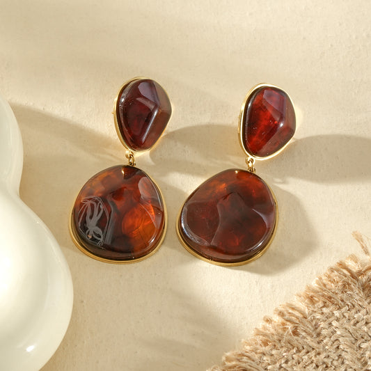 Boucles d'oreilles dorées pendantes cabochons ovales ambré