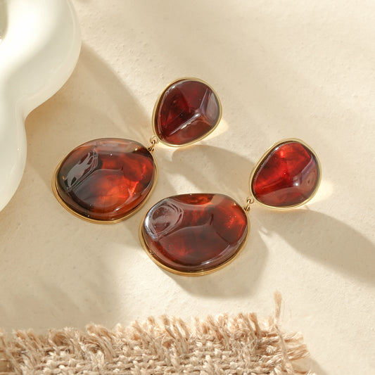 Boucles d'oreilles dorées pendantes cabochons ovales ambré