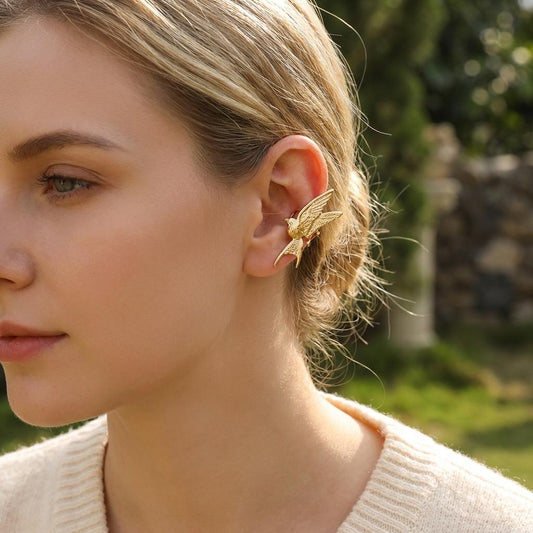 Earcuff bague d'oreille dorée hirondelle