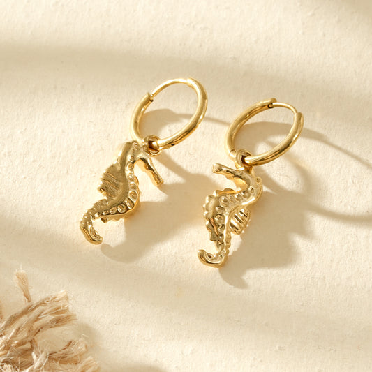 Boucles d'oreilles créoles dorées pendantes hippocampes