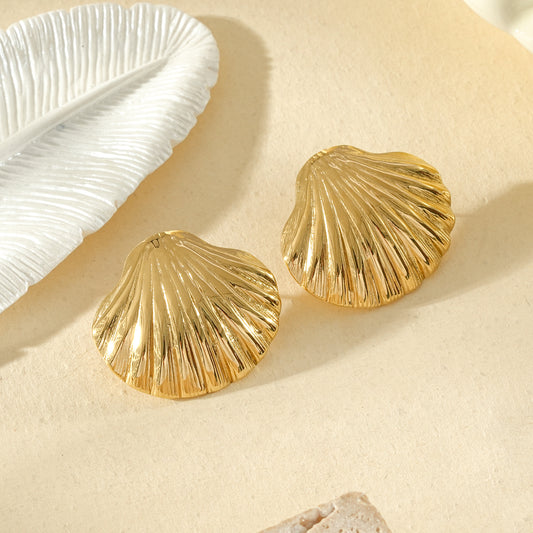 Boucles d’oreilles dorées coquillage texturé