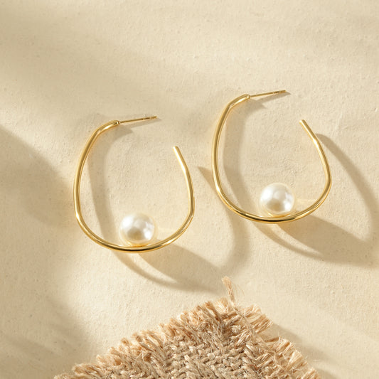 Boucles d'oreilles dorées créoles ouverte ovale avec perle