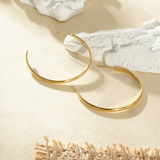 Boucles d'oreilles dorées créoles ouverte ronde